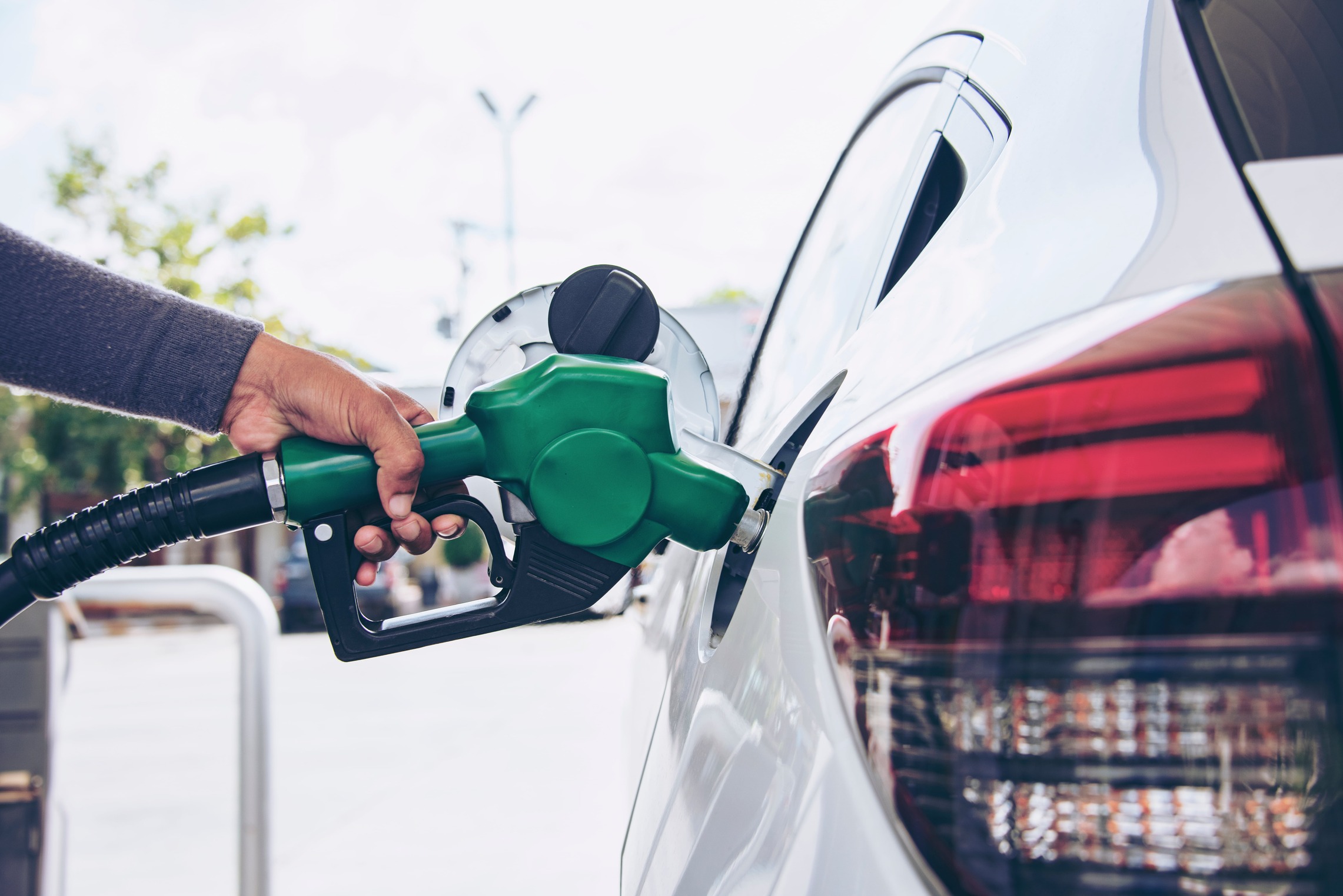 car being filled with petrol