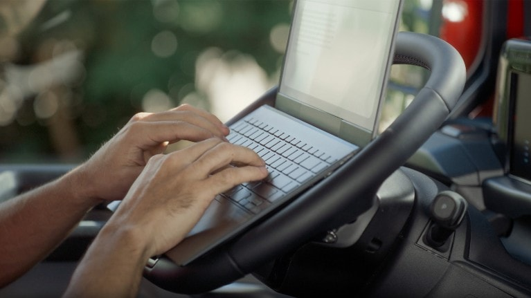 Ford Pro Service Laptop on steering wheel